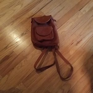 Vintage camel colored mini backpack